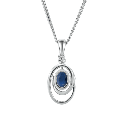 Silver, blue topaz and cubic zirconia pendant