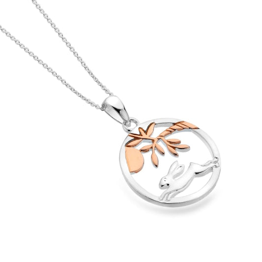 silver and rose gold plated hare and tree design pendant