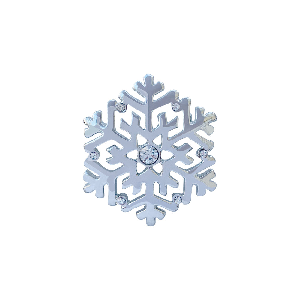 Silver tone snowflake brooch with white stone detail