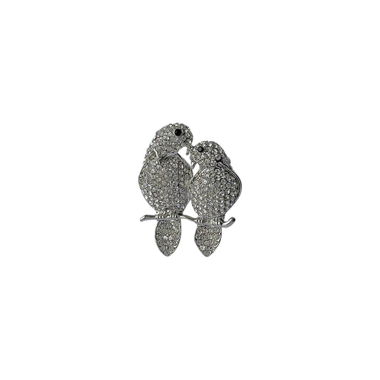 Silver tone two parrots brooch with white stone detail