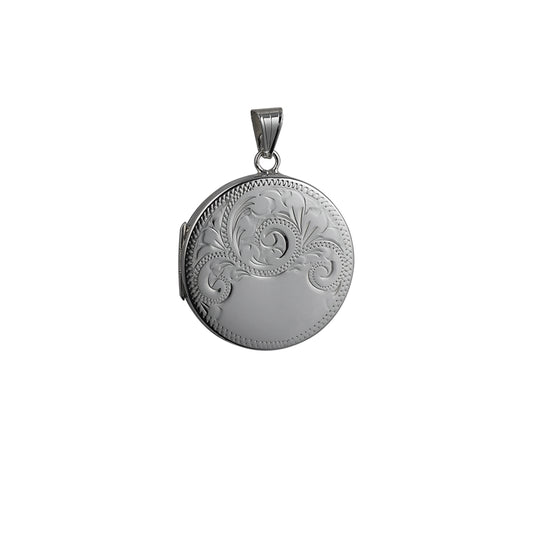 silver circular patterned locket on a silver chain