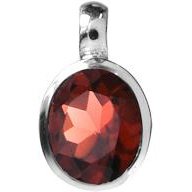 Silver and garnet small oval pendant.