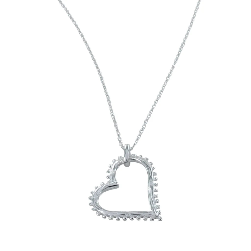 Silver heart pendant with beaded detail